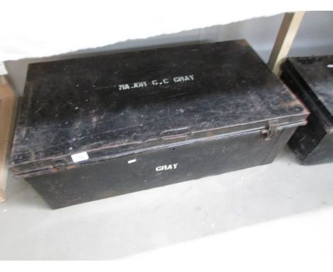 A named tin trunk.