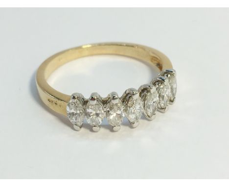 An 18ct yellow gold 7 stone diamond ring, size K.