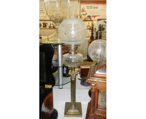 A brass Corinthian column oil lamp with font &amp; etched shade