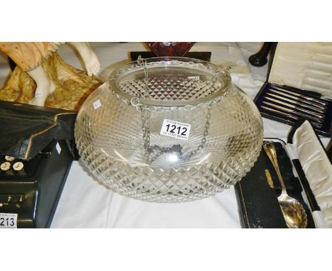 A large glass up lighter lamp shade.