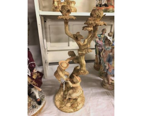 A Royal Worcester figure group as a candelabra (complete).