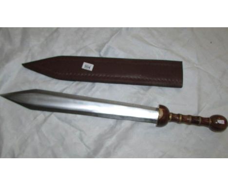 A replica sword in scabbard.