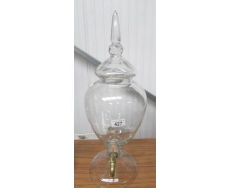 An Apothecary/pub glass dispenser with brass tap.  (Please note:  We are unable to insure glass for transit so recommend that