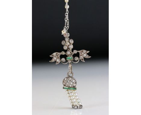 Early 20th century diamond, emerald and seed pearl yellow and white metal pendant necklace, the flower head and foliate motif