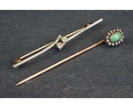 Victorian turquoise and diamond silver and yellow metal cluster stick pin, the oval cabochon cut turquoise with fourteen smal