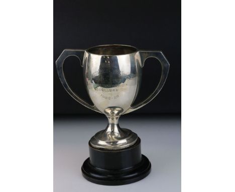 Silver twin handled trophy, engraved presentation inscription "From the British Fresian Cattle Society to Mr H. K. Henly, who