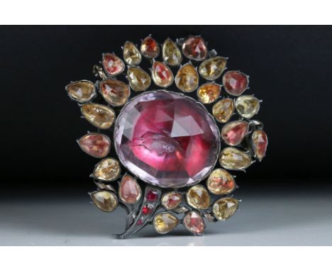 Late 18th century Spanish amethyst, citrine and ruby silver brooch modelled as a stylised flower, foiled settings, the large 