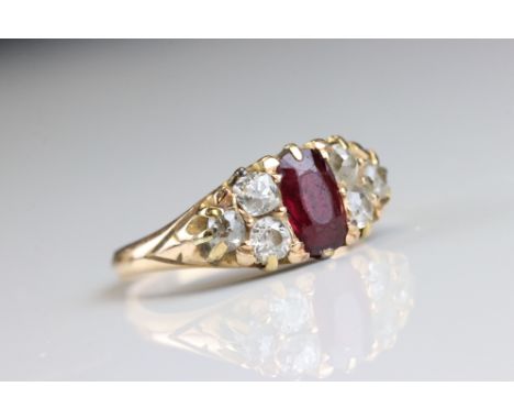 Late Victorian/ Edwardian ruby and diamond yellow gold boat head ring (resizing has removed hallmark) the oval mixed cut ruby