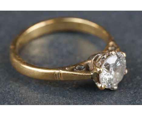 Diamond solitaire 18ct yellow ring, the diamond weighing approx 1.0 carat, assessed clarity P2, six claw setting, tapered sho