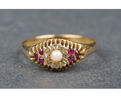 Pearl, diamond and ruby unmarked gold boat head cluster ring, cream seed pearl to centre, surround of eight small rose cut di
