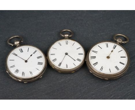 Three small silver open faced key wind pocket watches, white enamel dial, black Roman numerals, two with blank cartouche vers