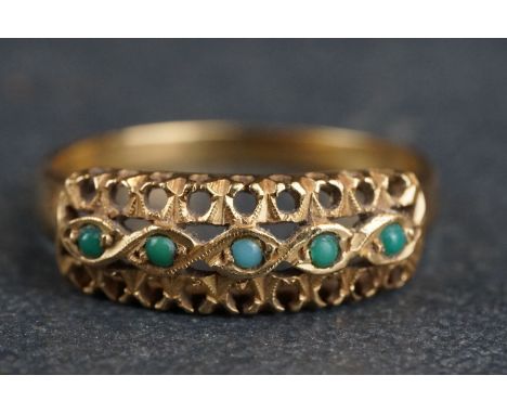 Turquoise five stone 18ct yellow gold ring, five small round cabochon cut turquoise stones, carré crossover setting, pierced 