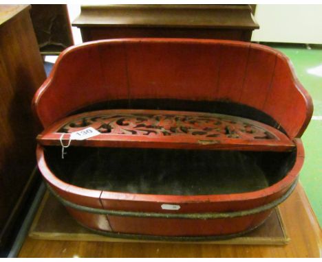 A Japanese red lacquer trough with pierced shelf (s/a/f)