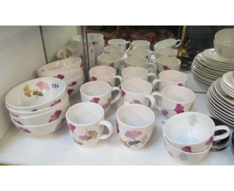 A Portmerion Gingko pattern dinner service consisting:- eight dinner plates, eight purple dinner place plates, eight side pla