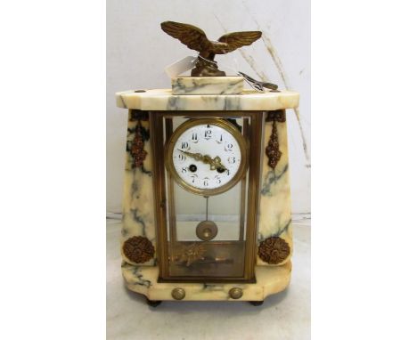 A marble and glass four side clock with white enamel dish and eagle surmount