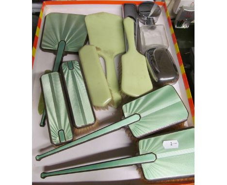 A five piece silver and green enamel brush and mirror set and various other dressing table items