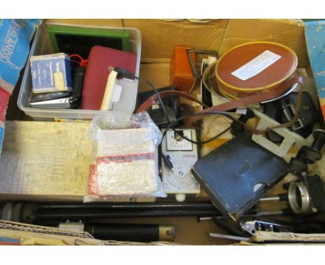 A box of miscellaneous camera items including computrol film loader