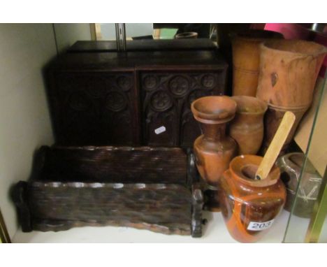 A wall mounting shelf with ecclesiastical doors and other treen