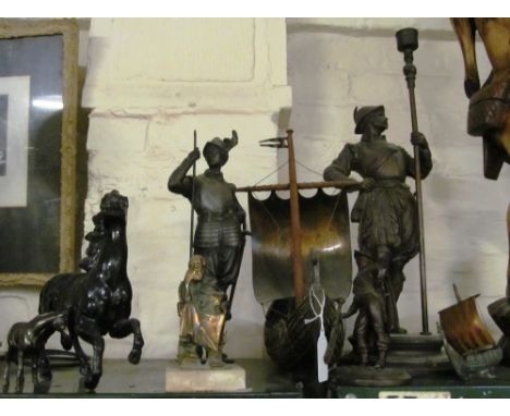 A spelter lamp base soldier holding a staff, two Viking boats and other models