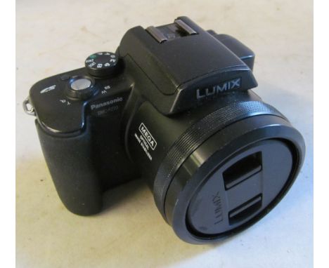 A Panasonic Lumix camera (i.c), Fuji Finepix (i.c) and an empty case