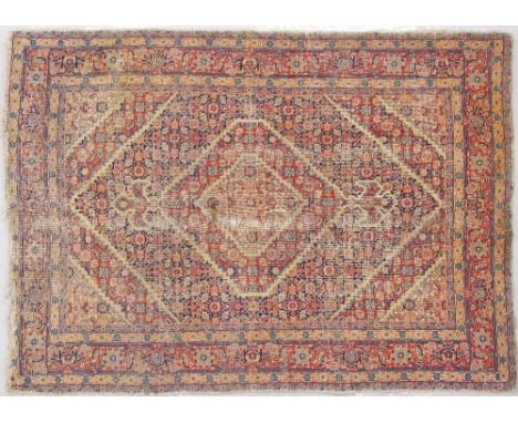 An Iranian carpet 135X187cm, pile wear and no fringe.
In-house packing &amp; shipping in the EU at €104.