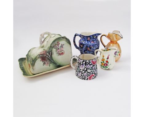 A collection of antique ceramics comprising an English c19th century ceramic butter or cheese dish the cover of a humped form