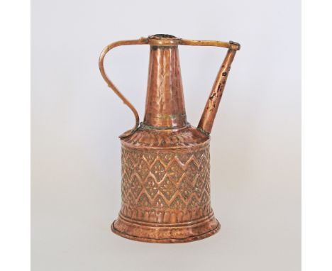 A Turkish Ottoman copper ewer, with repousse decoration to the body, circa 19th century. H33cm.
Provenance: Dr. Takis K. Evan