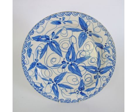 A large English delftware tin glazed Islamic influence blue and white ceramic charger c18th century. W35cm.
Provenance: Dr. T