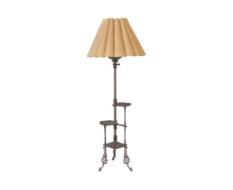 An Austrian Art Nouveau Ditmar oil lamp on metal three tier stand later converted to electricity, c19th century. The main oil