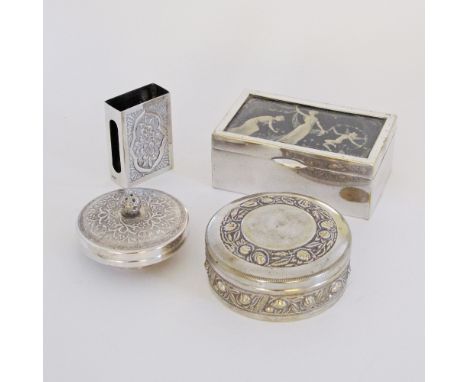 A round white metal footed box with lid engraved with flowery designs - unmarked. Án Egyptian silver matchbox cover engraved 