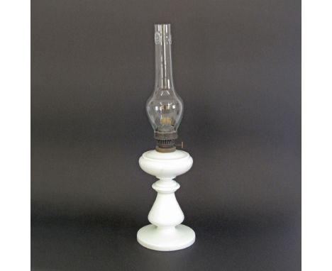 An Austrian Ditmar white opaline glass oil lamp with the original glass chimney c19th century. H50cm. Condition: hairline cra