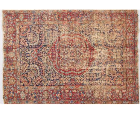 An Iranian carpet 133X185cm, pile wear and no fringe.
In-house packing &amp; shipping in the EU at €92.