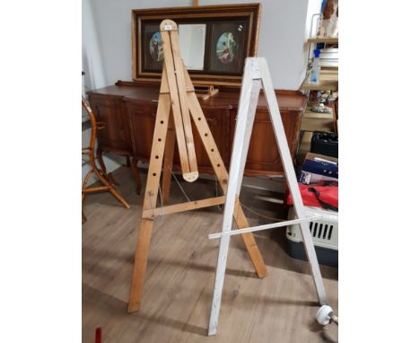 A LARGE PINE STANDING EASEL PLUS ONE OTHER