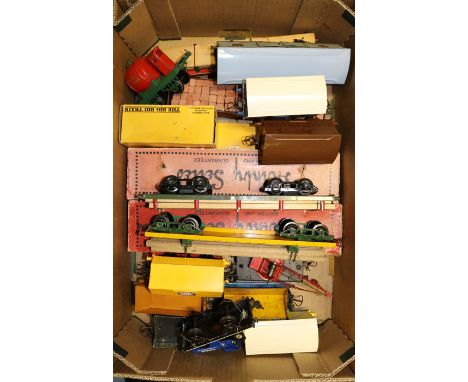 A quantity of Hornby O gauge rolling stock. 2x Trolley wagons, red/green and light grey/red, both boxed. An NE No.2 high capa