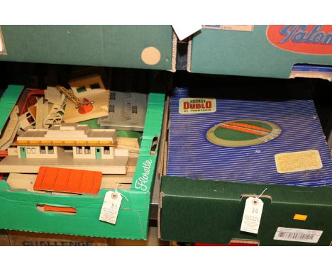 A quantity of Hornby Dublo railway. Including 2x girder bridge, a D1 turntable, through station, signal cabin, two-track tunn