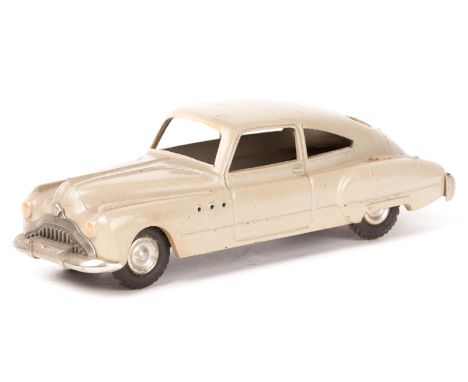 A Marklin Buick Special Fastback Sedan (52). An example in fawn with tinplate base and aluminium spun wheels with black herri