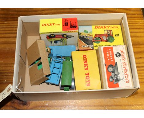 7 Dinky Toys. A Dumper Truck (562) in yellow with red wheels. A Motocart (342) in green with brown load bed and red wheels. A