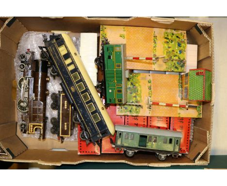 A quantity of French Hornby etc O gauge rolling stock. A   clockwork 4-4-2 NORD tender locomotive 31301 with correct bogie te