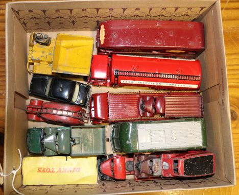 A small quantity of Dinky Toys. A Leyland Octopus tanker in the red livery of Esso, a Foden flatbed lorry with chains in red,
