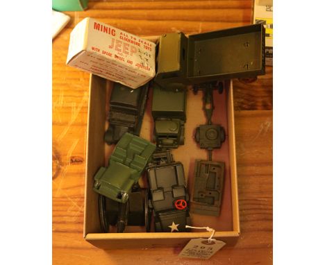 A small quantity of military vehicles etc. Tri-ang Minic clockwork US Army Jeep, (small scale) boxed. Dinky Toys:- Dragon tra