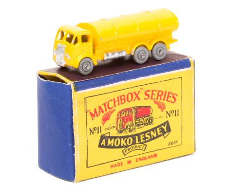 Matchbox Series No.11 ERF Road Tanker. Bright yellow body with silver radiator and fuel tanks, with grey metal wheels. Boxed,