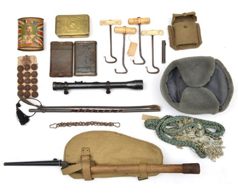 A WWII entrenching shovel, with webbing case and alternate bayonet which can be fitted to make  a close combat weapon; a pris