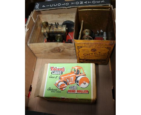 A Tri-ang Minic clockwork Aveling-Barford Road Roller.  In dark green with grey plastic wheels. Boxed, with original paperwor