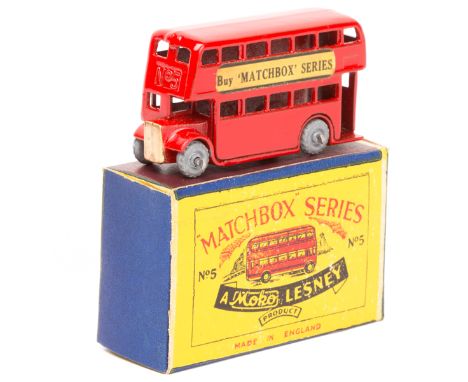 Matchbox Series No.5 London Bus. In bright red with gold radiator, ‘Buy Matchbox Series’ paper labels adverts to sides and li