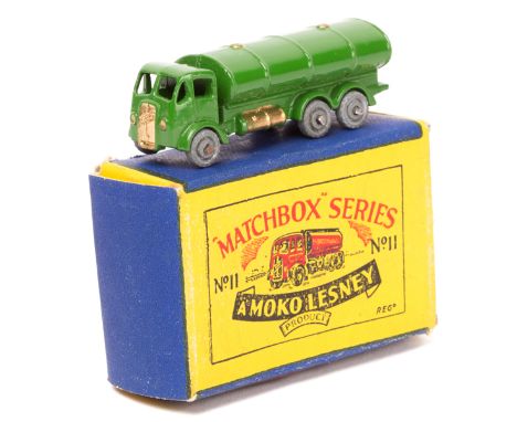 Matchbox Series No.11 ERF Road Tanker. A rare example in green with gold radiator and fuel tanks, with grey metal wheels. Box