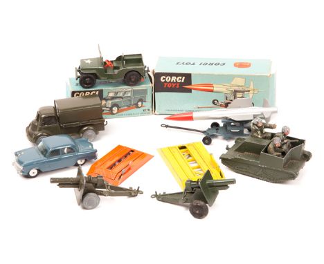 3 Corgi RAF items. Land Rover (351) with rear tin tilt. Plus Thunderbird Guided Missile on Assembly Trolley (350). Both boxed