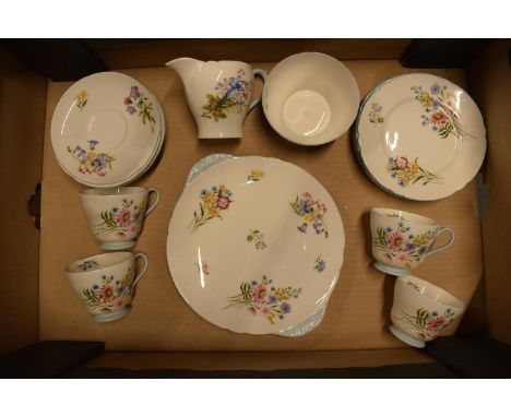 Shelley tea set in the Wild Flowers design (13668) to include 7 saucers, 6 side plates, 4 cups, milk and sugar and a cake pla