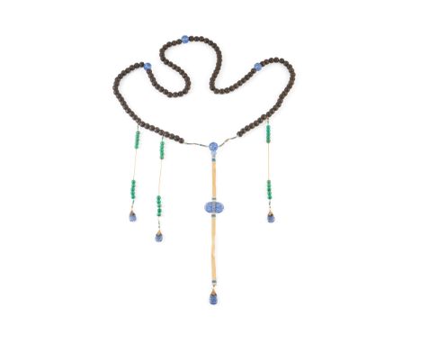 沉香木朝珠 comprising one hundred and eight agarwood beads, spaced with translucent blue beads, the main tassel adorned with a pea