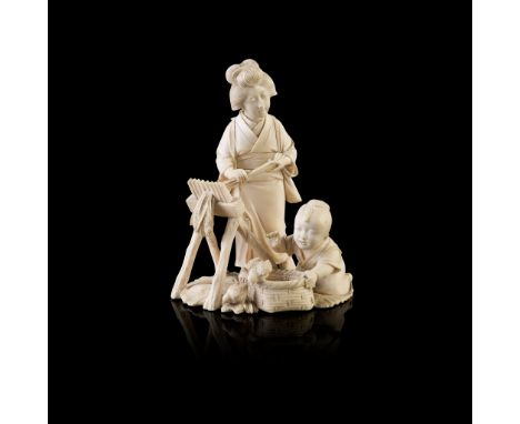 明治 象牙雕婦童打穀置物 depicting a traditional rice threshing scene, the female figure feeding the freshly cut plants into a Senbakoki 