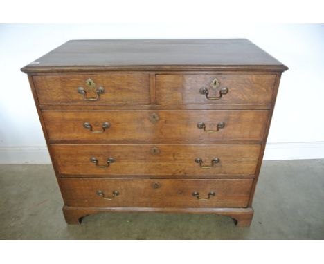 A 19th Century Oak Chest with two short over three long drawers - on bracket feet - 88 cm tall x 102 cm x 54 cm - in clean re